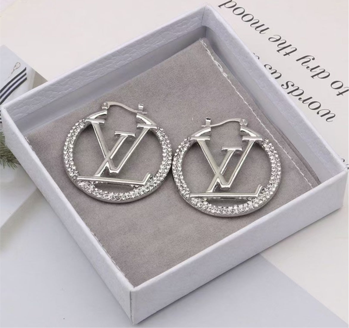 Silver LV woman earring